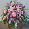 Our Elegant Embrace Casket Spray shares the warmth &amp; comfort your loved