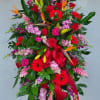A striking Tropical Surprise Garden Spray of beautiful flowers lets you share