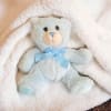 Our small blue teddy bear is 4.5 inches high sitting. it is