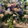 Spectacular array of roses, orchids, bells of Ireland and other select Dutch