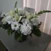 All white flowers on a square vase 