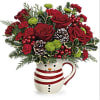 The Frosty Wishes Bouquet includes miniature red carnations, green button spray chrysanthemums