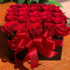 25 red roses, can be arranged with an additional color if desired.