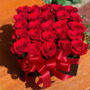 25 red roses, can be arranged with an additional color if desired.