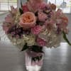 Elegant arrangement features beautiful Hydrangeas, roses, Alstromeria Lilies