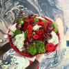 Brighten any space with our Elegant Flower Bouquet! Bursting with vibrant blooms