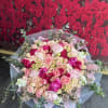 Brighten any space with our Elegant Flower Bouquet! Bursting with vibrant blooms
