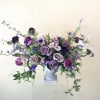 A seasonal lavender and plum mix of gorgeous high end florals comes