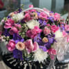 A FULL BASKET WITH MIXED ROSES ,VANDA ORCHIDS,ROSES AND SPRAY ROSES 