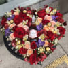 Customized heart with flowers and champagne bottle included in the price we