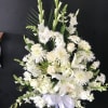 all white funeral basket arrangement