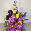 A bold and lively display of color, the Vibrant Harmony Floral Arrangement