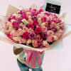 Symphony of Colors is a magnificent bouquet featuring 100 roses in a