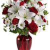 Mix vase with a dozen roses, lilies and daisies 