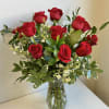 Long Stem Dozen Red Roses in Clear Glass Vase with Assorted Greens