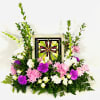 Royal Burst Cross Stained Glass adorned with white roses, purple carnations, white