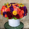 Premium Roses, Hydrangea, Lisianthus, Ranunculus, and more elegant flowers in ceramic vase.