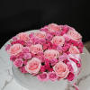 The Heartfelt Pink Roses arrangement is a stunning display of love and