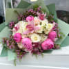 The Mini Cupid with Peonies is a beautifully crafted bouquet perfect for