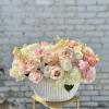 Stunning and luscious mix of seasonal white and ivory blooms. Perfect style