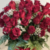 Marvelous arrangement of 60 long stem red roses with baby&rsquo;s breath and