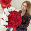 Huge box of 125 roses with gorgeous orchid on the top 
Premium