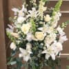 A BEAUTIFUL  ARRAY OF ALL WHITE, ROSES, SNAPS AND MORE.
