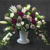 When selecting sympathy flowers as a tribute, aim for arrangements that evoke