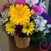 You will surely brighten their day with this bright and cheery arrangement