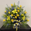 This custom sympathy arrangement is appropriate for both funeral services and to