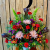 This custom sympathy arrangement is appropriate for both funeral services and to