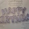 Air filled Happy Birthday scripts in silver for decorating 