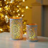White enamel candle wells with gold interior, comes in two sizes. Comes