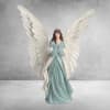 A winged angel made from metal, enamel coated, measuring approx 18 inches