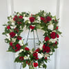 Red roses, white lisianthus, white stock, white astilby, red berries and premium