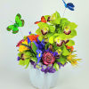 Beautiful spring colors arrangement with orchids, hydrangea, roses, and mix flowers