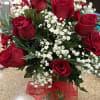 dozen red roses with greenery and baby&rsquo;s breath