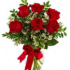 Six beautifully vased red roses. 