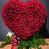This breathtaking heart-shaped floral arrangement is composed of approximately 400 red roses
