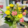 Tulips Spring Bouquet includes tulips, and greenery in a cylinder vase. 