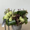 - Combines natural elements with rich, luxurious flowers for a balanced aesthetic.
-