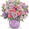Dreamy blooms! This stylish bouquet, featuring delicate pinks and shimmering lavenders, looks