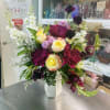 A playful spin on the classic rose bouquet, these lovely lavender blooms