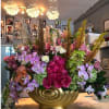 This amazing piece of art is a beautiful combination of colors, orchids