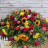 Lovely casket spray to honor your loved one.  Includes a variety