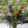This highly textured garden arrangement is a feast for the eyes! Our