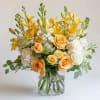 Brighten up someone&rsquo;s day with this sunny floral piece. Fitting for so
