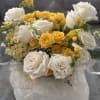 Brighten up someone&rsquo;s day with this sunny floral piece. Fitting for so