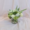 Immerse yourself in the serene beauty of our Lush Tranquility floral arrangement.