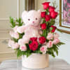 This adorable box arrangement of 10 red and 10 pink roses, accented